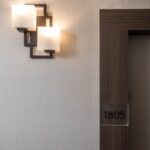 New lighting in resident corridors at New resident door facade at Flamenco Towers