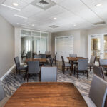 Renovated party room with new flooring, lighting and paint in Miami, FL by Capital Contractor Services