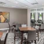 Renovated party room with new flooring, lighting and paint in Miami, FL by Capital Contractor Services