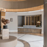 Capital fabricated and installed the quartz top front desk at Three Tequesta Condos in Miami, FL during the lobby renovation