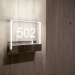Door tag at harbour House, renovated by capital
