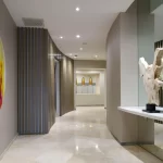 Hallway with view of mailboxes renovated by Capital