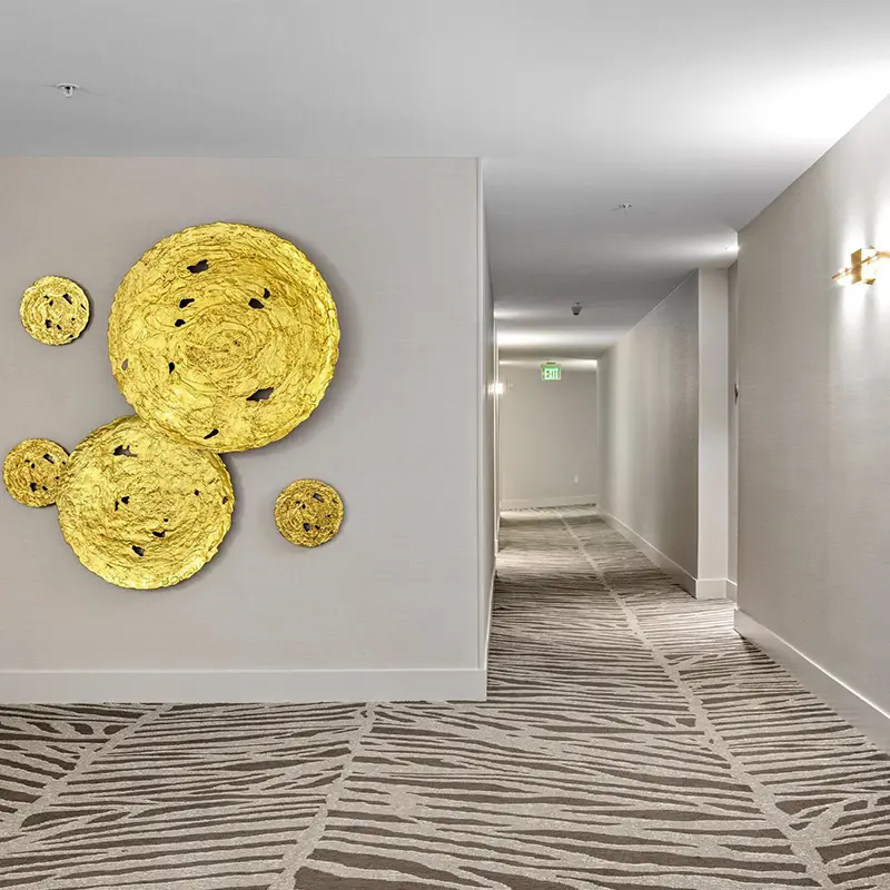 Resident corridors with art installation and new painting wall coverings and carpet