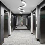 Penthouse elevator lobby with new flooring, lighting and wall coverings by Capital Contractor Services