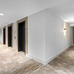 Common floor elevator lobby and resident corridor at The Waverly renovated by Capital Contractor Services