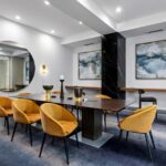 Capital Contractor Services renovated the Costa Brave conference room, including new carpeting, lighting, paint, furniture and marble columns.