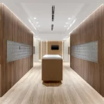 Mailroom at the Roney Plaza with wood wall paneling and cove ceilings by Capital Contractor Services