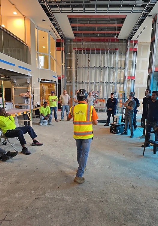 Members of the Capital Contractor Services team in a Safety meeting