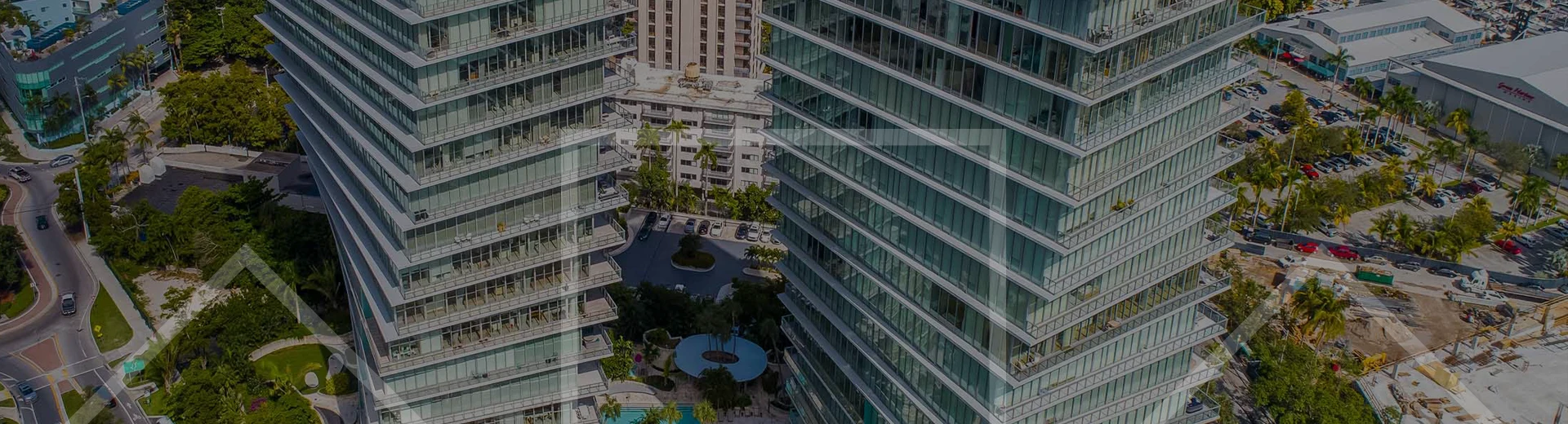 Grove at Grand Bay background image of the towers